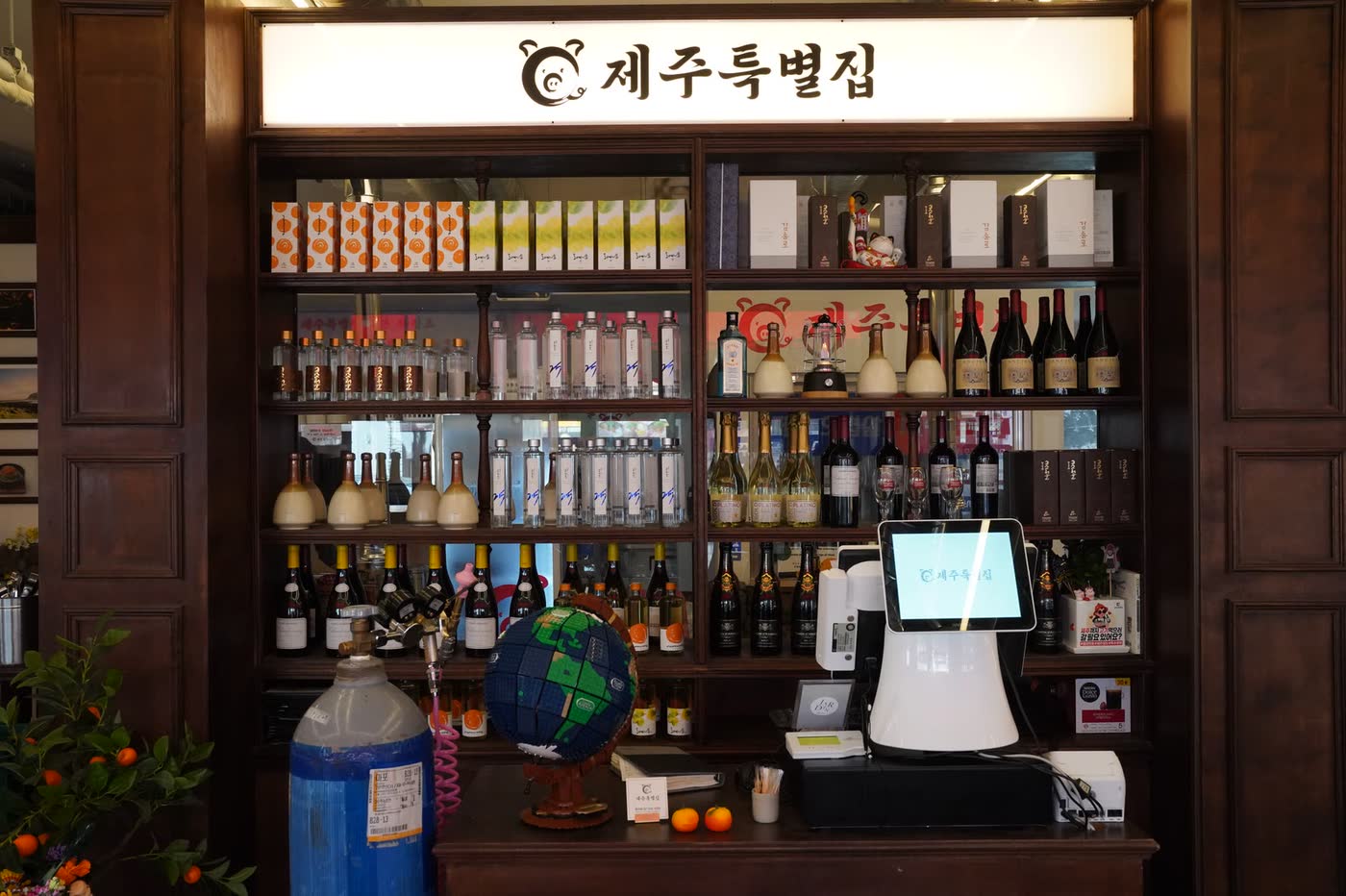 제주특별집 홍대점 매장 6 — Jeju Special House Korean BBQ restaurant in Hongdae, Seoul (storefront, interior and dining room)