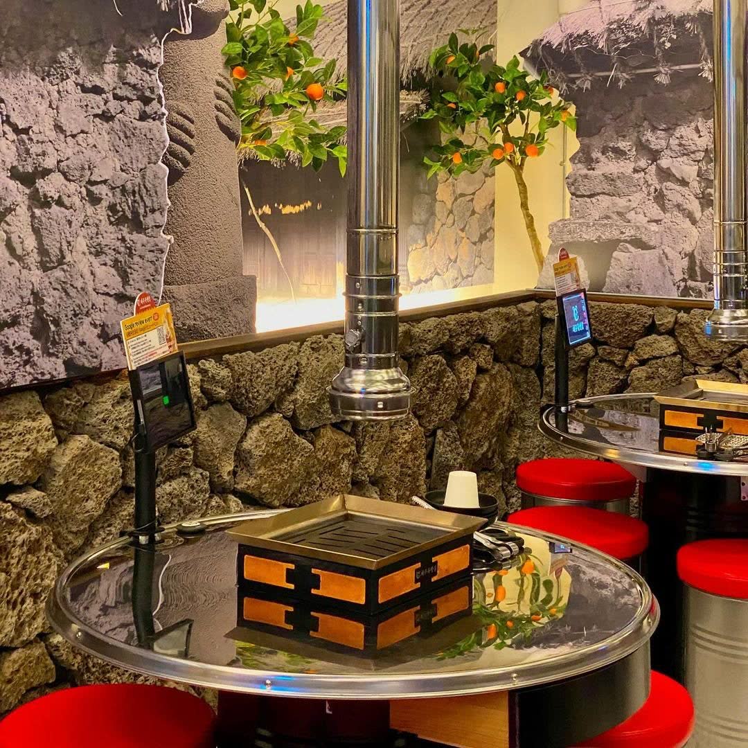 제주특별집 홍대점 매장 2 — Jeju Special House Korean BBQ restaurant in Hongdae, Seoul (storefront, interior and dining room)